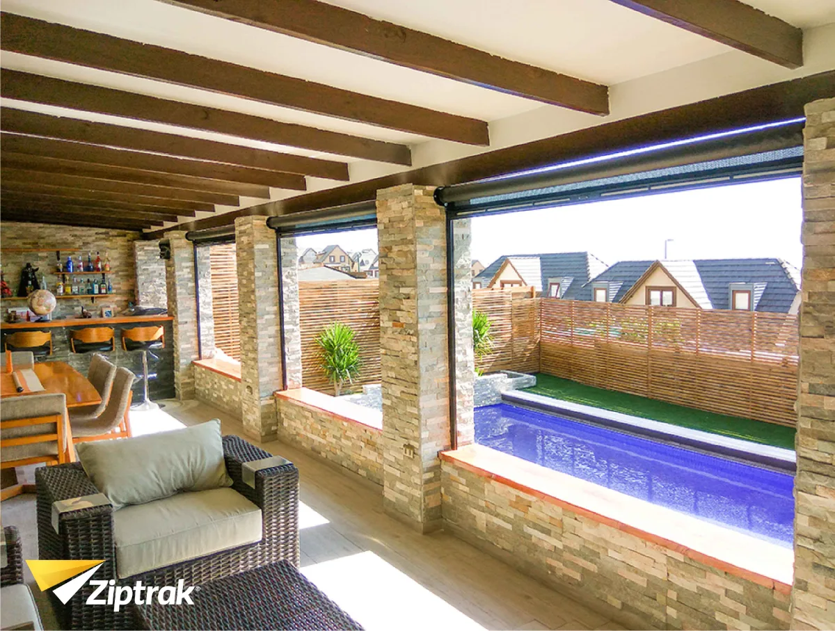 Feature project: outdoor entertaining area fully enclosed with Ziptrak blinds.