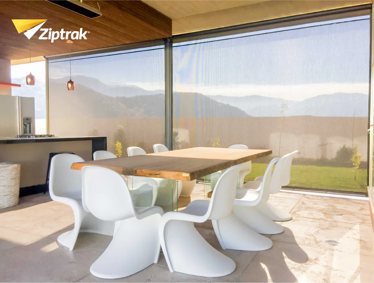 Patio with Ziptrak blinds partly lowered for shade.