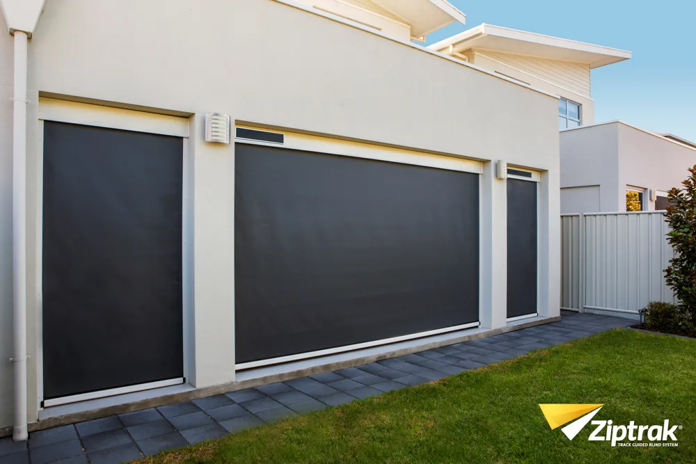 Café-style blinds enclosing a covered deck.